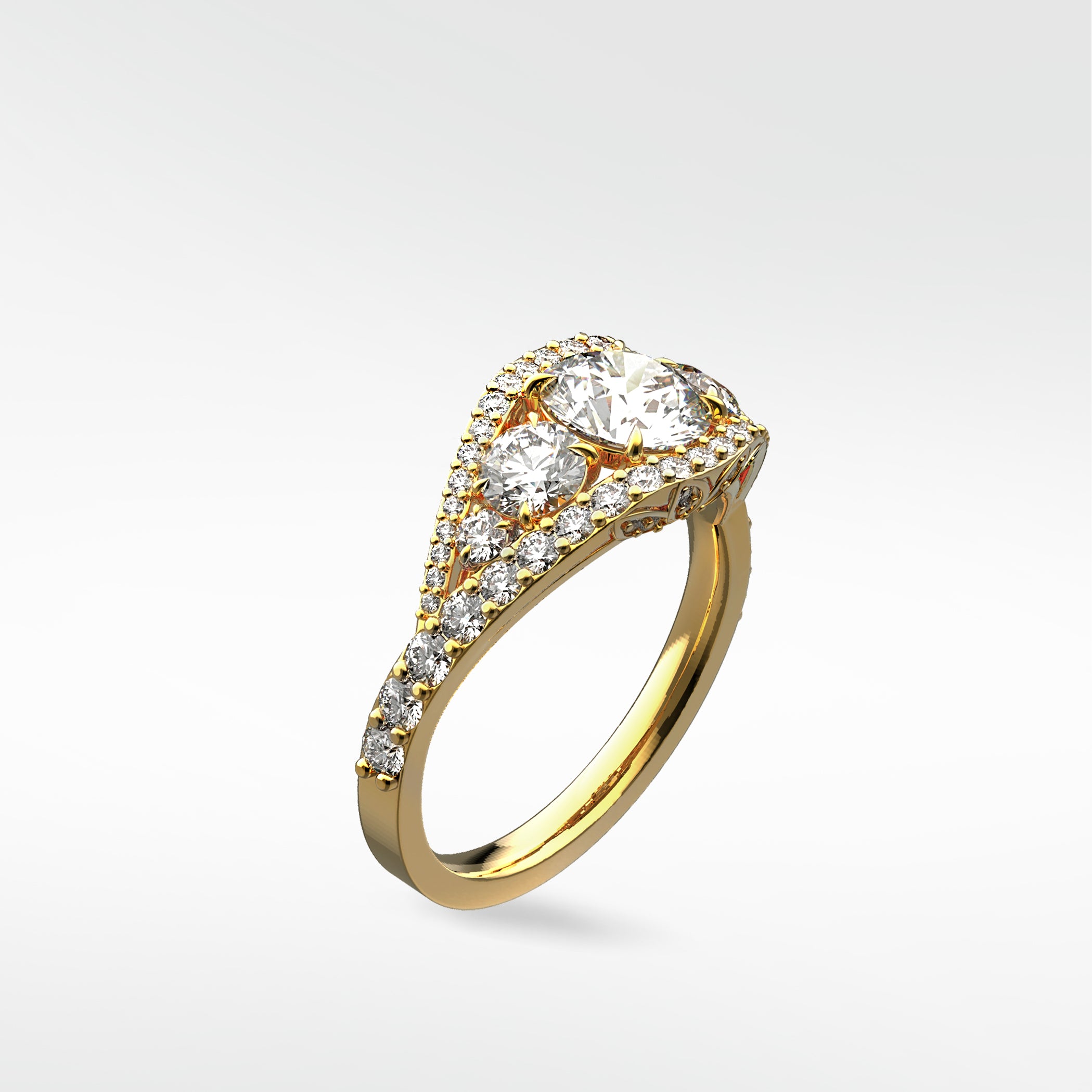 A three-quarter view of the Torreya Diamond Engagement Ring in yellow gold, featuring a unique three-stone halo setting.