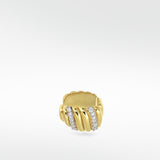 The Palm Diamond Ear Cuff in ridged yellow gold, featuring two sparkling bands of pavé diamonds on a white background.
